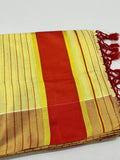 Tissue saree with orange strips design border light orange